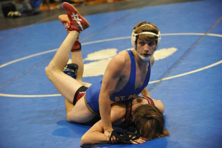 Senior Trey Leblanc looks at Coach Kettleson for advice. (Photo by Karen Davis)