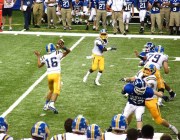 Ryan O'Krepki throwing a screen pass to Marcus Gaines