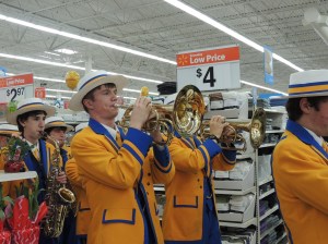 Drew Bratschi plays his horn at Walmart's parade for special needs children in 2014.