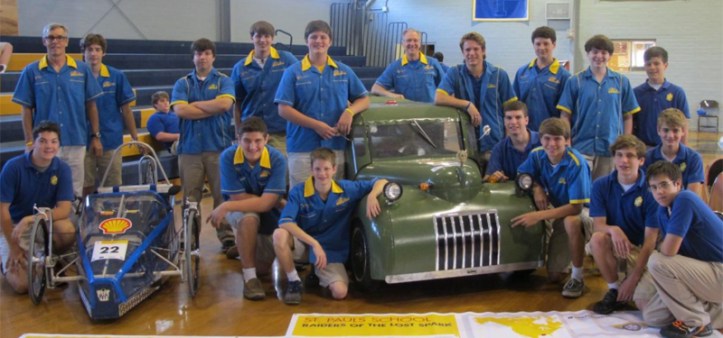 Eco-Car Club members pose with their creations at a school assembly following the Shell Eco-Marathon competition in Houston (photo by Danielle Lavie)