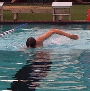 Tri-captain William Munn works on perfecting his freestyle stroke at a recent practice. (photo: Turner St. Romain)