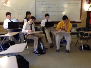 The defense team listens to a witness testimony (Photo by Adam Satterlee)  