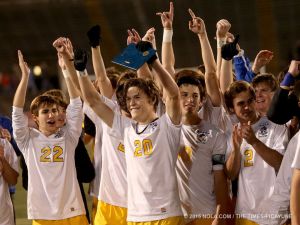 Senior Forward Barrick Roberts celebrates with his State Championship MVP Award.