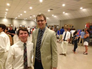 Sophomore Oliver Sibley and Art teacher Andrew Dart at the Art show having a great time. (Photo credit By Jordan Kliebert 