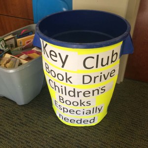 Collection bins for the Key Club children's book drive currently sit in various locations on campus. (photo by Ealon Boudreaux)
