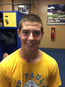 Two weeks into the new school year, freshman football player Thomas Bourgeois' hair is slowly returning. (photo: Spencer Fox)