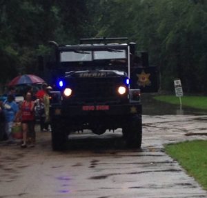 A police rescue truck prepares to venture into the flood waters. (Photo by Landon Chambliss)
