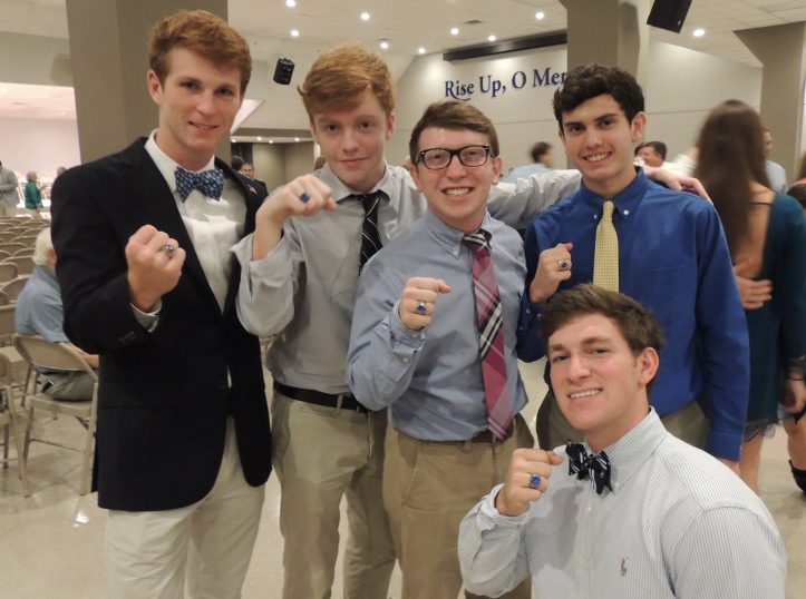 Seniors Will Murphy, Austin LeBlanc, Oliver Sibley, Zach Serpas, and Thomas Carriere show off their rings.