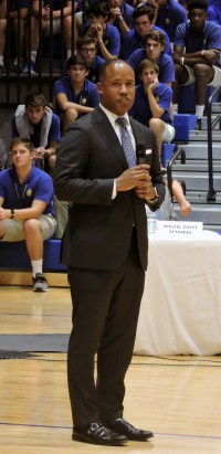 U.S. Attorney Kenneth Polite addresses the student body in the new gym regarding the dangers of opiod abuse. (Photo by: Karen Hebert)