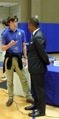 U.S. Attorney Kenneth Polite is interviewed by Luc Hebert after he spoke at St. Paul's. (Photo by: Karen Hebert)