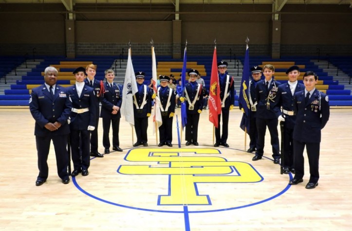 The St. Paul's JROTC Color Guard prepares to serve at the Veterans' Day assembly. (Photo by Karen Hebert)