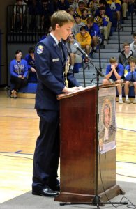 JROTC leader Ruston Keller delivers the opening address at the assembly. (Photo by Karen Hebert)