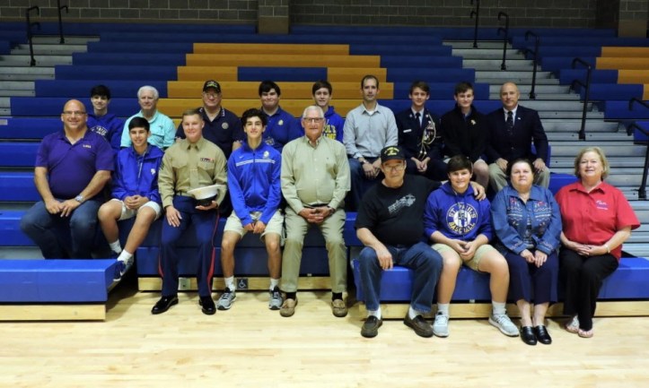 Members of St. Paul's alumni veterans unite with their St. Paul's student relatives.
