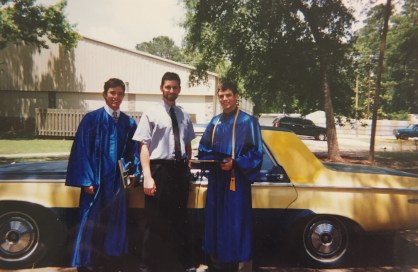 Pichon, along with Morvant (left) and Johnson (right), poses with the SPS School Car following the Class of 2004's graduation on Sunday, May 16, 2004. (Photo courtesy Richard Pichon)