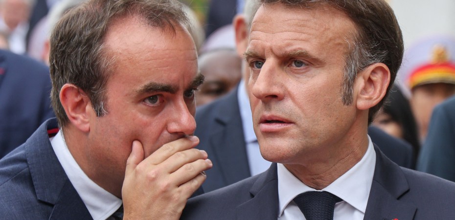 France's President Emmanuel Macron speaks with France's Minister of Armed Forces Sebastien Lecornu (Credit: Ludovic MARIN / AFP)